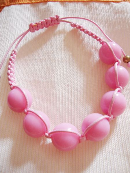 Pulseira de Bolas Rosas